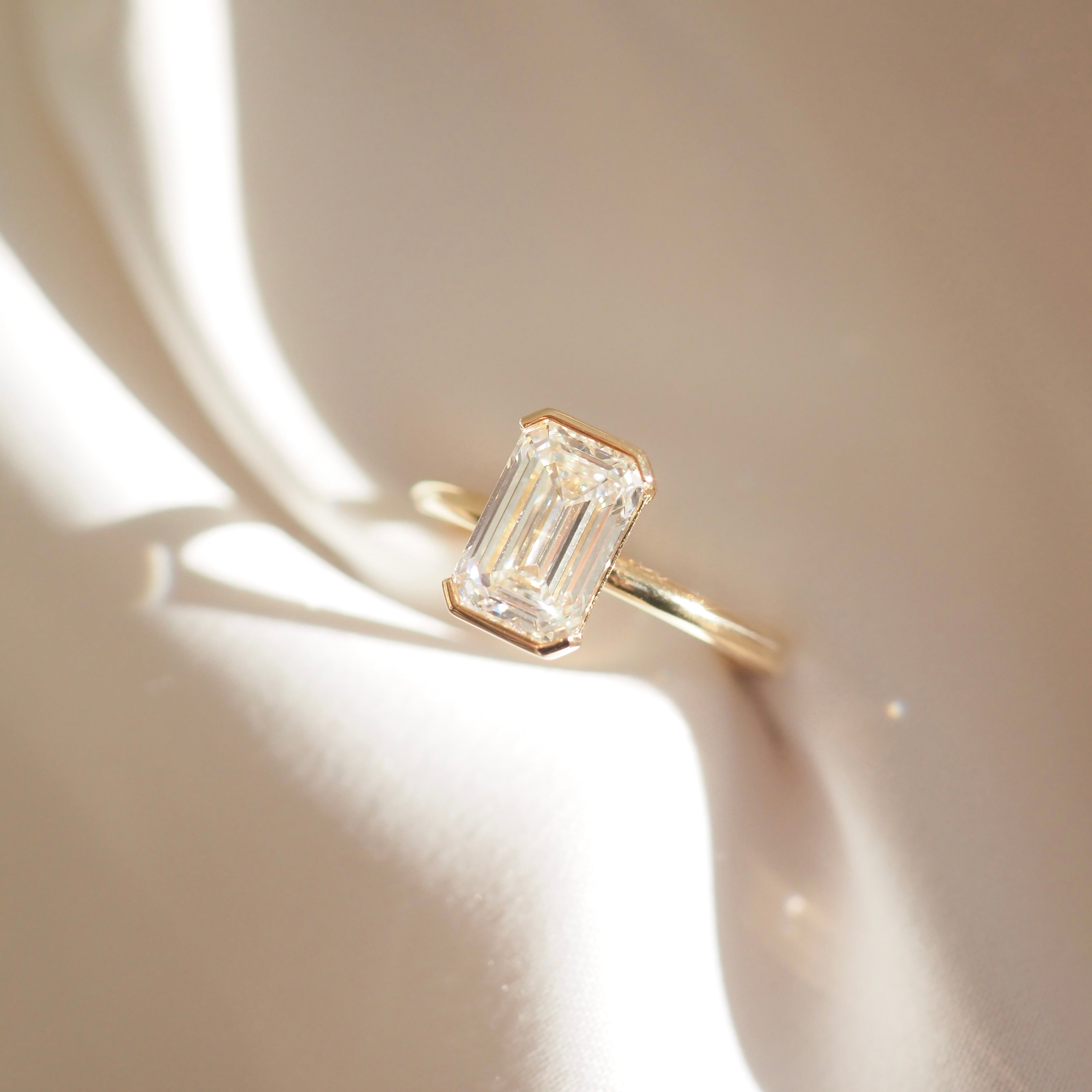 Evie | Emerald Half Bezel Solitaire Lab-Grown Diamond Engagement Ring