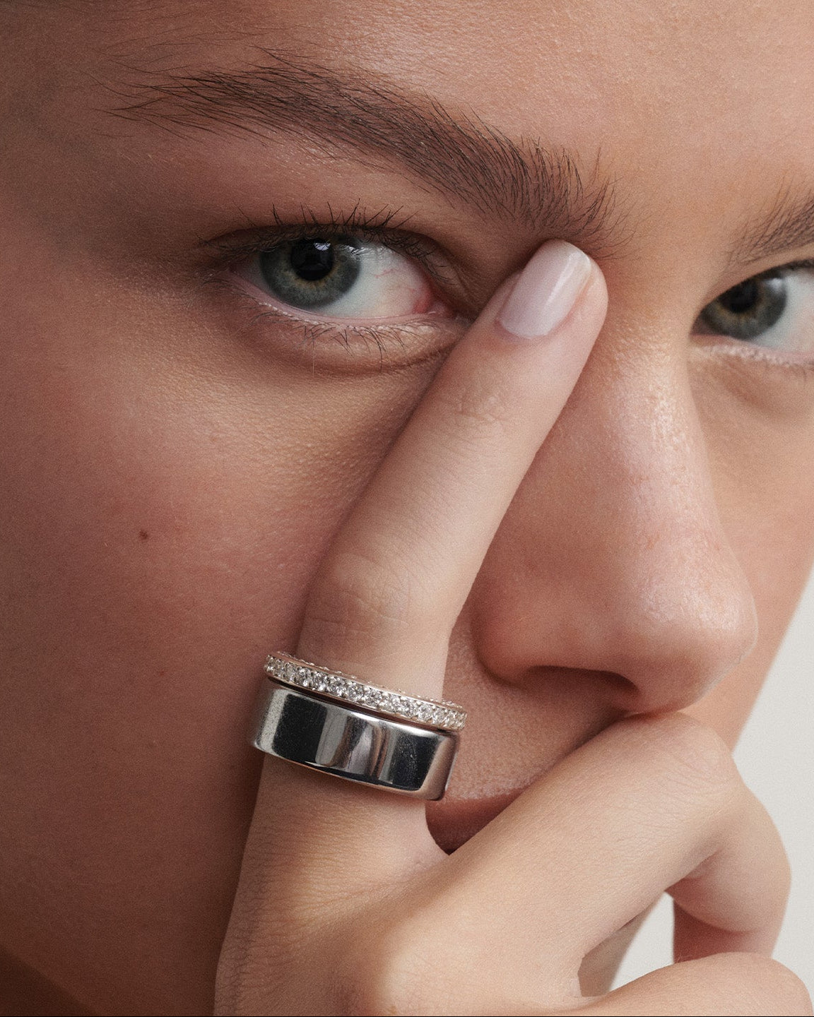 Our Wellness Ring (18ct White Gold, 8) stacked with the Oura Ring
