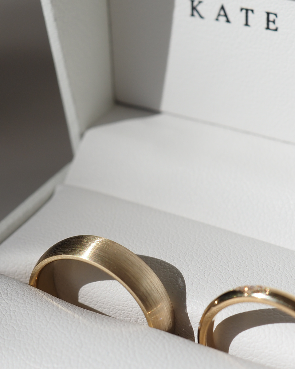 Our classic half-round wide wedding band is 6mm wide and 1.9mm thick. It has a polished finish in 18ct yellow gold.[text overlay: 6mm Brushed Finish in Yellow Gold]